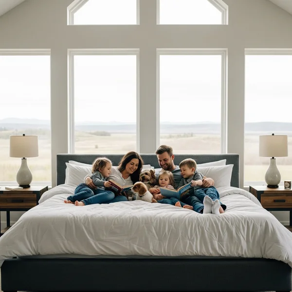 Large family co-sleeping comfortably on an Alaskan King bed